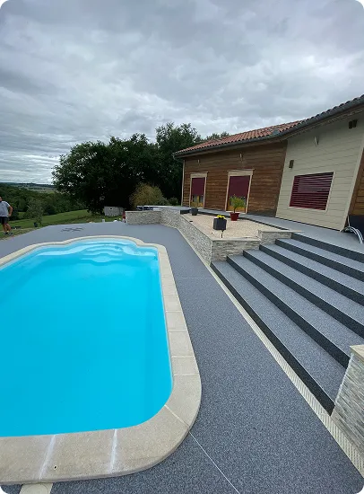 moquette de pierre grise pour contour de piscine à Estancarbon près de Saint-Gaudens en Haute-Garonne 31